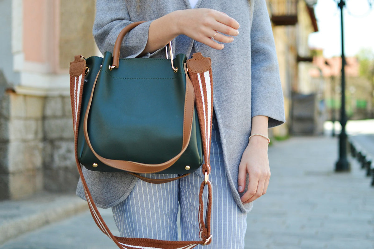 Green and tan leather shoulder bag